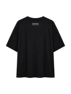 Back of the MONUMENTS 1904 World Cup oversized tee in heavyweight black cotton jersey.