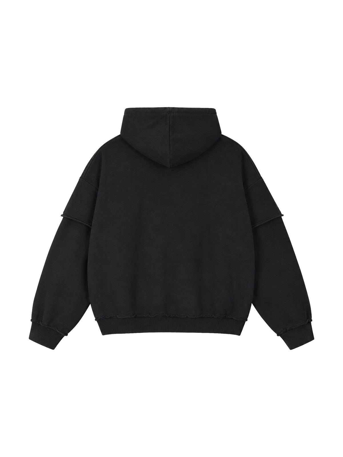 Back of the MONUMENTS raw-edge oversized hoodie in washed black heavyweight cotton.