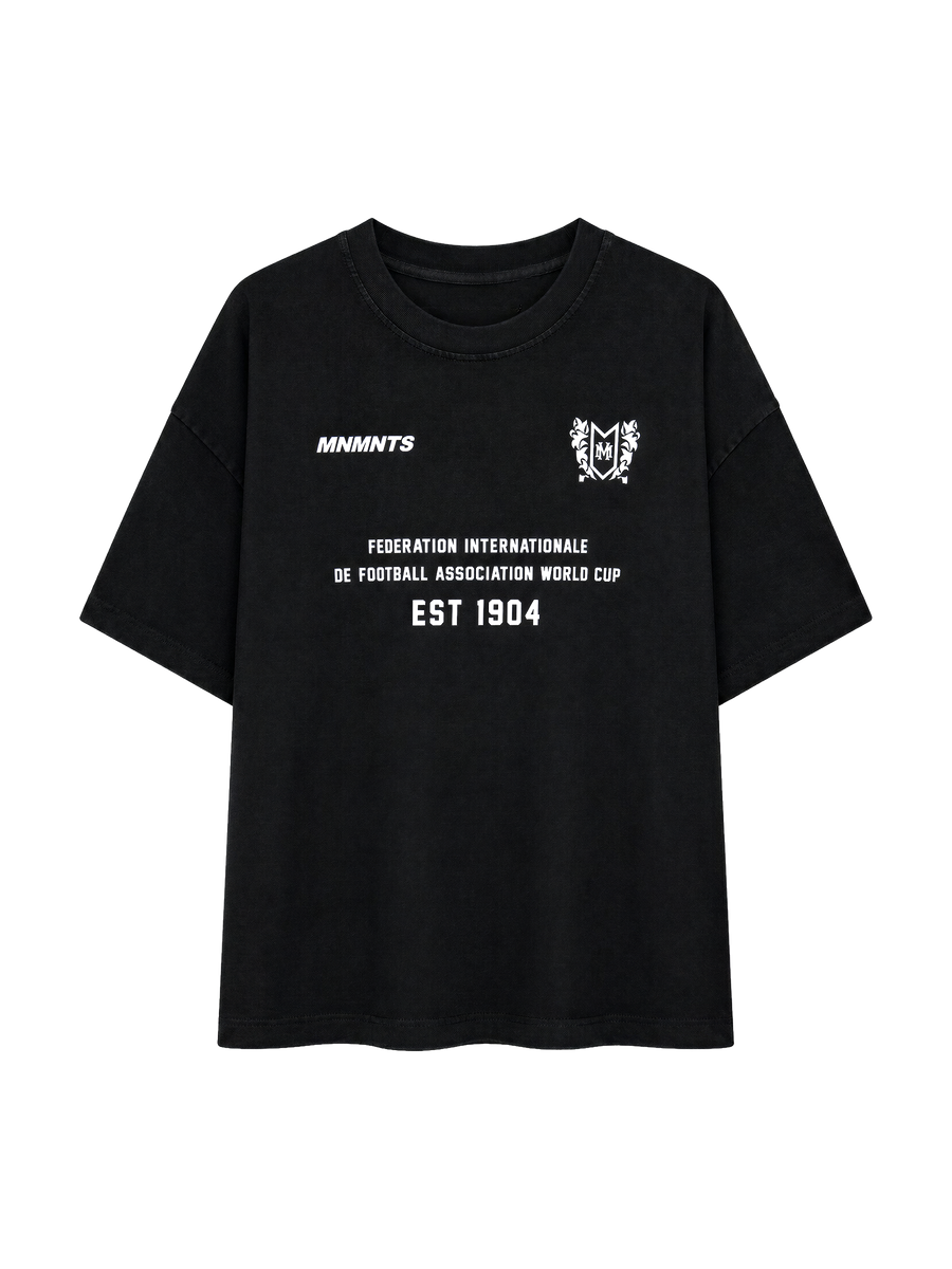 MONUMENTS 1904 World Cup oversized tee in black cotton jersey with bonded 1904 Federation front artwork, front view.