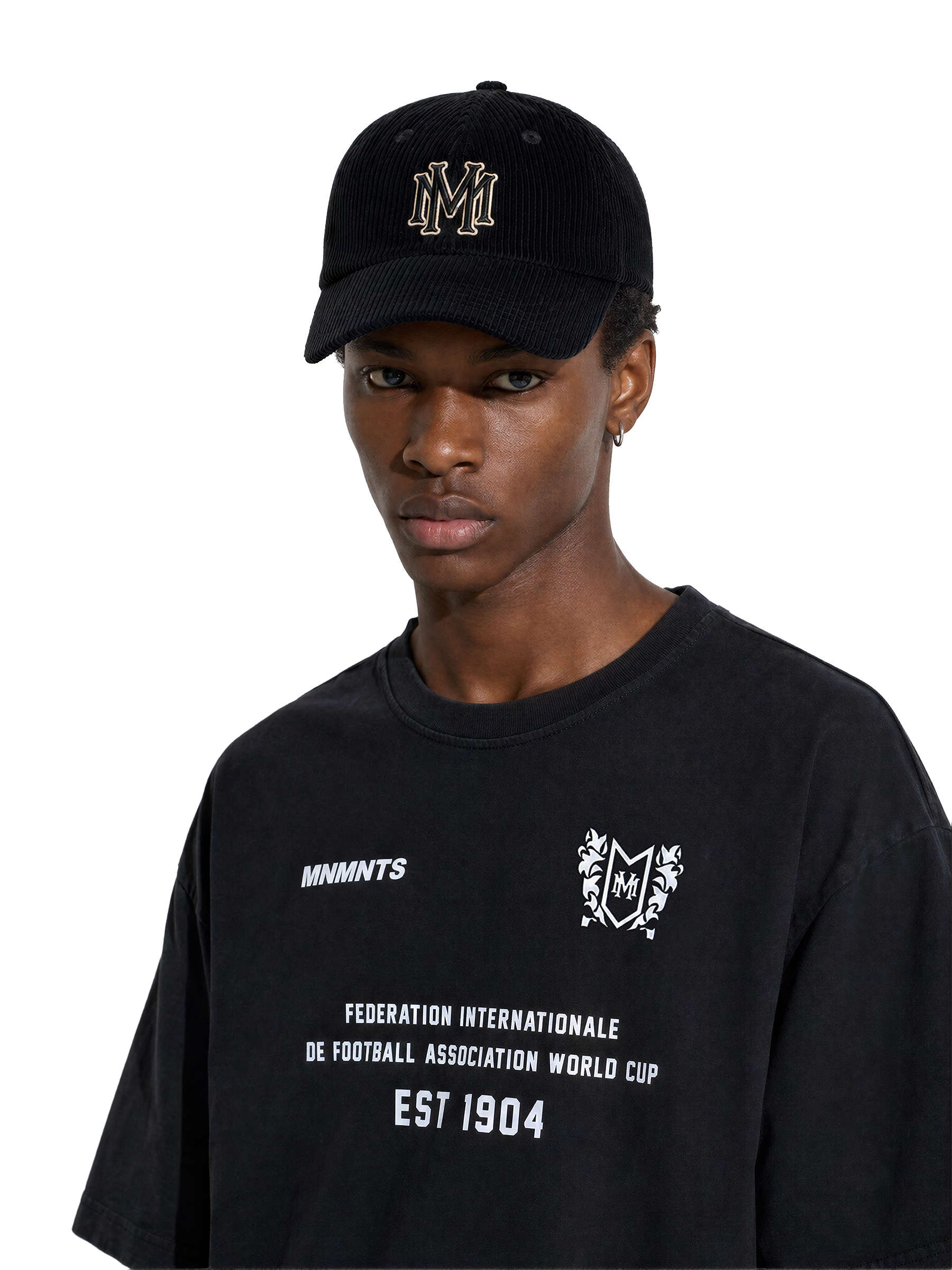 MONUMENTS six-panel corduroy hat in black with embroidered MM monogram.