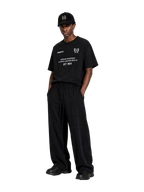 MONUMENTS 1904 World Cup oversized tee in heavyweight black jersey with a thick ribbed collar.