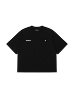 MONUMENTS MM core logo cropped boxy tee in black cotton with embroidered MM front artwork, front view.